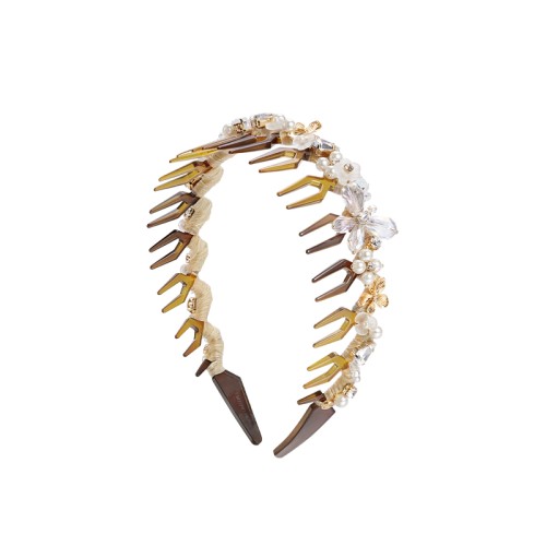 Ободок для волос с зубчиками золотой с кристаллами
